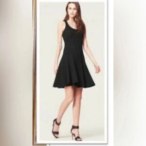 Loft black sleeveless fit and flare dress. Size 0P.  Good used condition